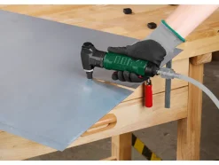 Perslucht knabbelschaar, naaldbikhamer of -onderhoudseenheid